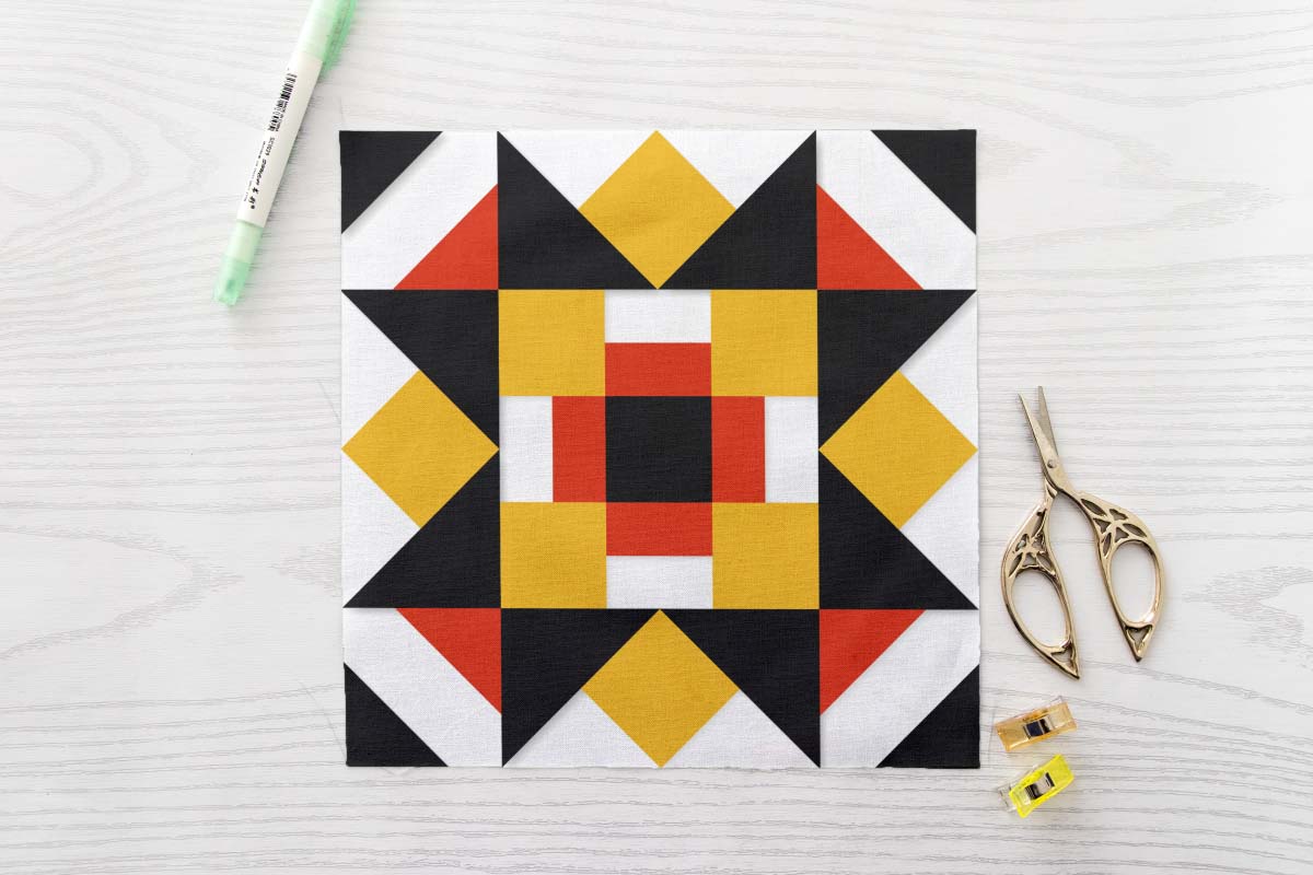 Framed Sawtooth Star FPP Quilt Block Pattern PDF - Bold Black Orange and Yellow Sawtooth Star Quilt Block with Framed Cross Centre